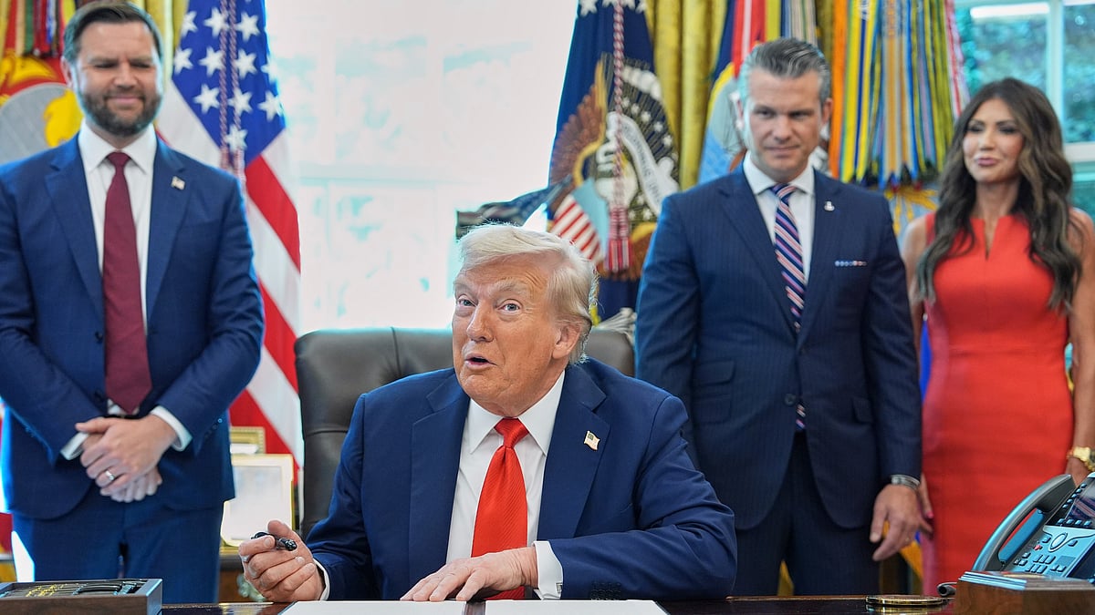Donald Trump signs an executive orders at White House