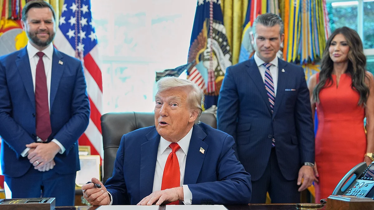 Donald Trump signs an executive orders at White House