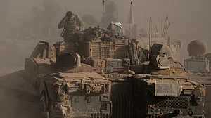 Israeli soldiers with their armored vehicles near Israel-Gaza border