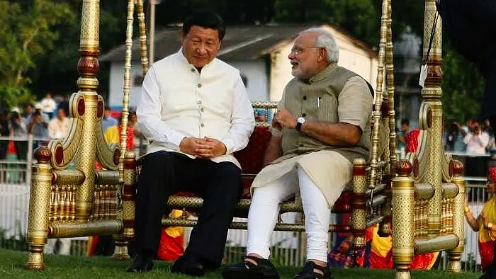 The jhoola shot: Modi and Jinping in Ahmedabad, September 2014
