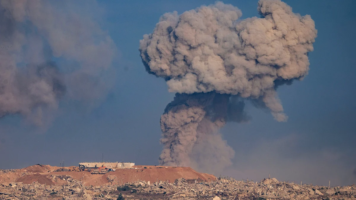 Smoke rises after an Israeli military strike in northern Gaza Strip, as seen from southern Israel, 31 Aug