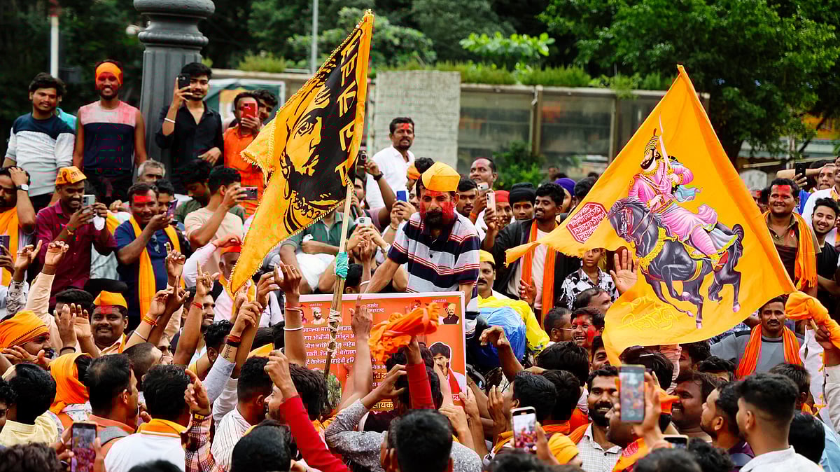 Maratha community members celebrate after the government accepted most of Jarange Patil's demands