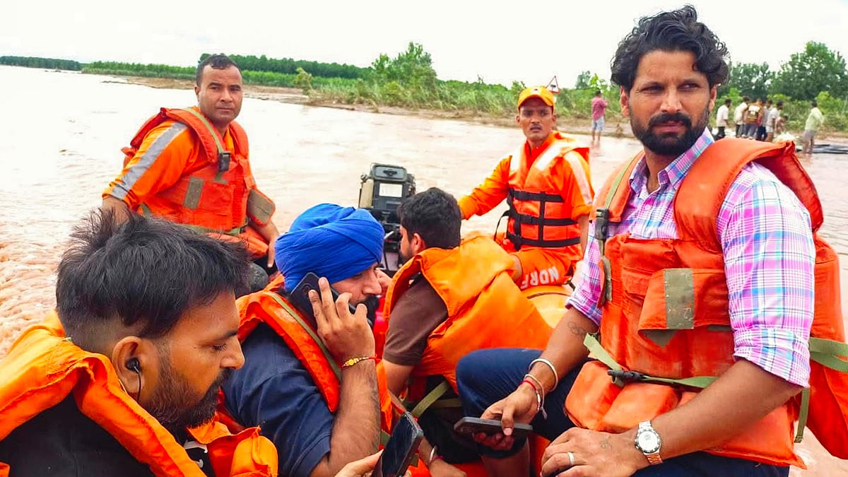 Tokyo Olympics bronze medallist Rupinder Pal Singh (right) on a rescue mission
