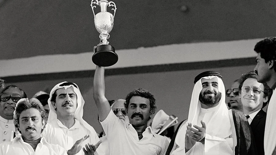 Where it all began: Sunil Gavaskar holds the 1984 Asia Cup trophy in Sharjah