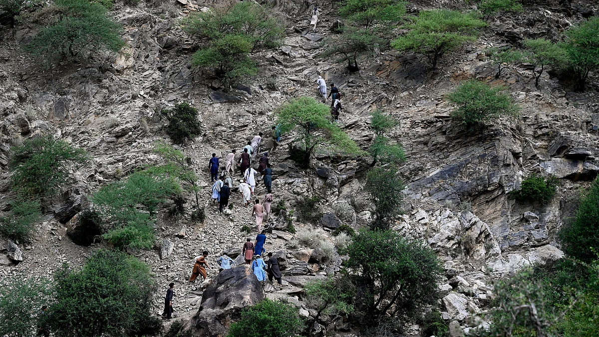 villagers rush to assist survivors in quake-ravaged Nurgol, Kunar