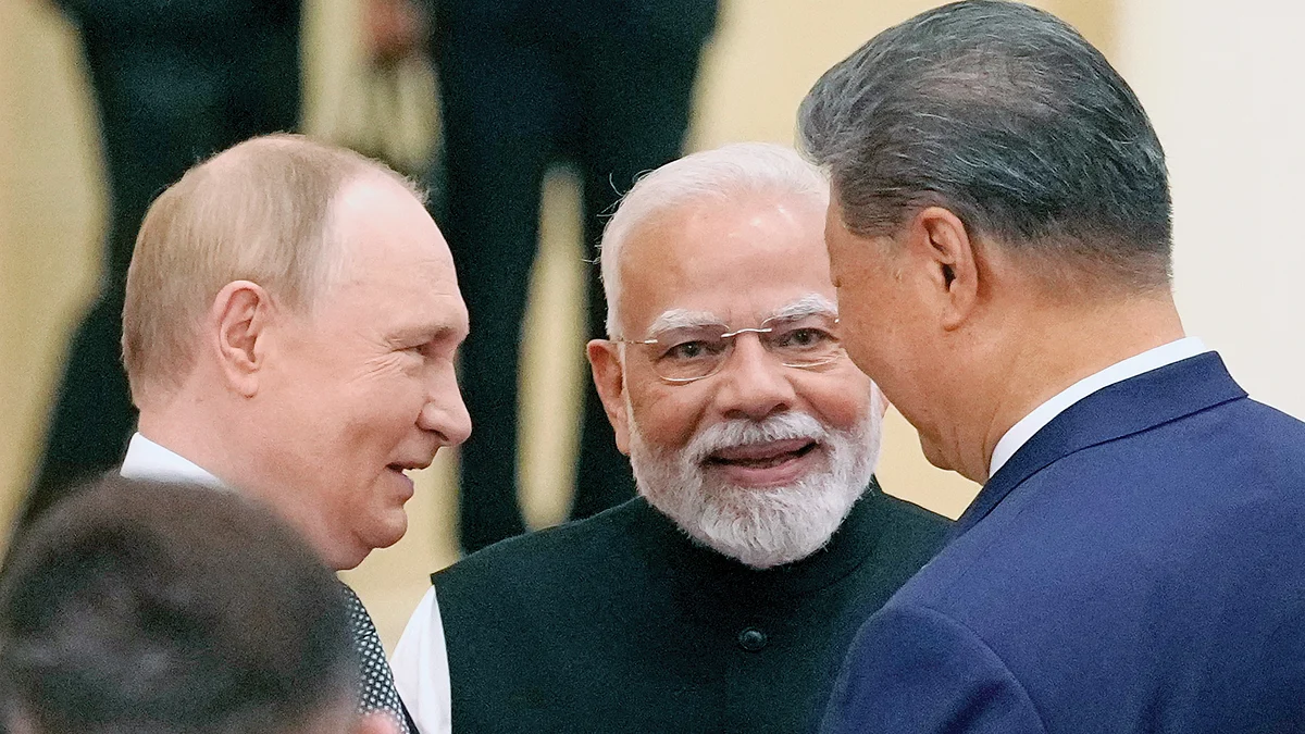 Theatrical bonhomie: PM Modi with Vladimir Putin and Xi Jinping at the Tianjin SCO Summit