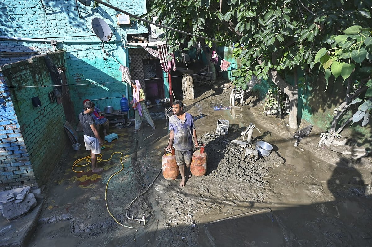 After Yamuna floods, drying homes and clearing silt big challenge for Delhi folks