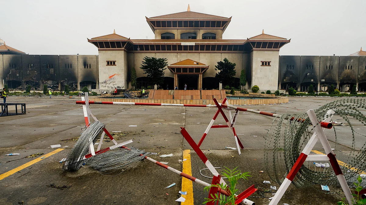 Nepal's Parliament building bears signs of the fire set to it by protestors