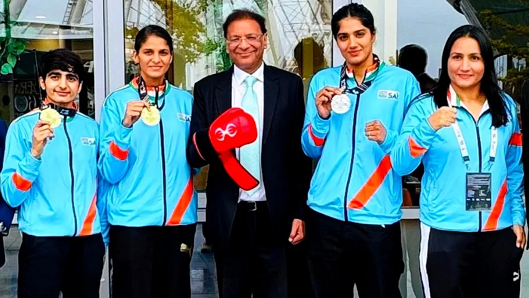 Iron fists: India's boxers show off their medals with BFI chief Ajay Singh in Liverpool