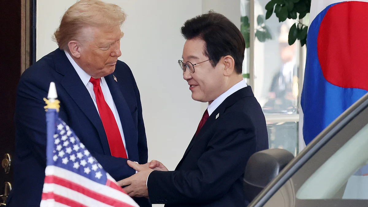 Donald Trump greets South Korean President Lee Jae Myung at White House in Washington.
