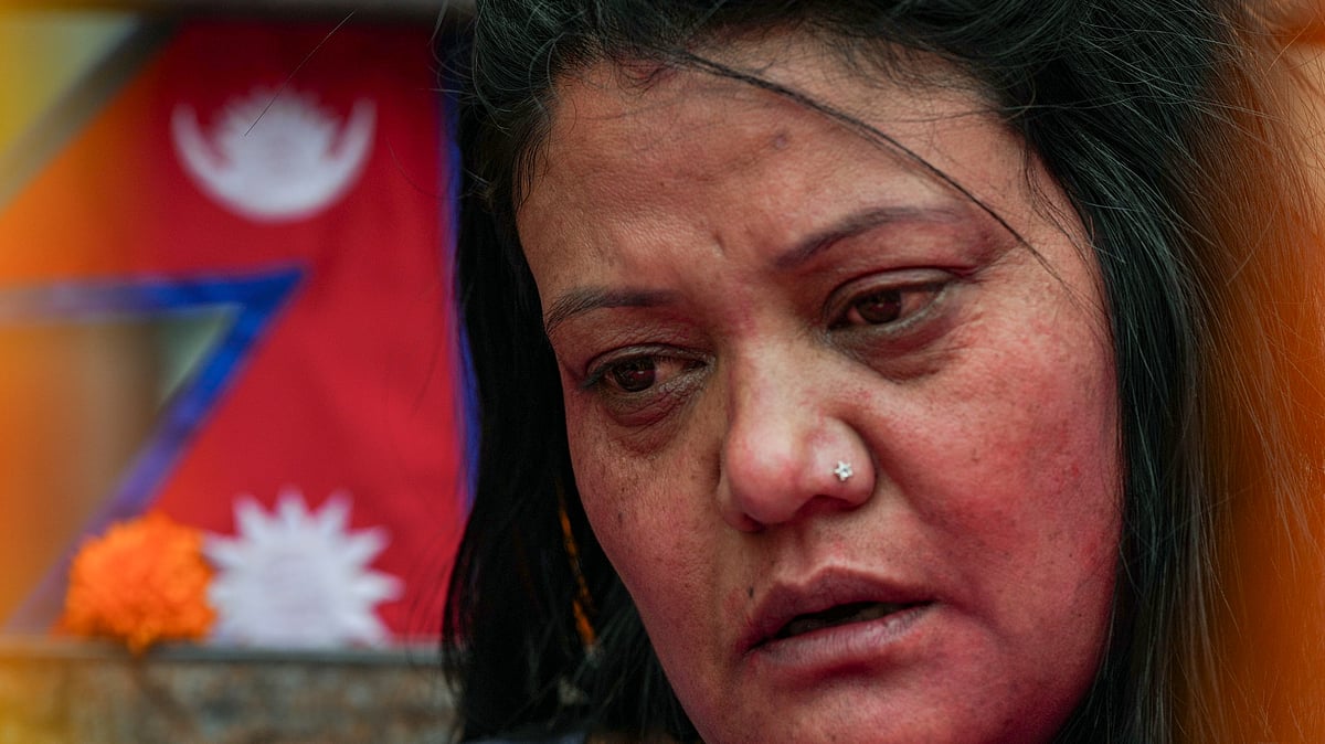 A Nepalese woman mourns a family member killed in the recent anti-government protests in Kathmandu
