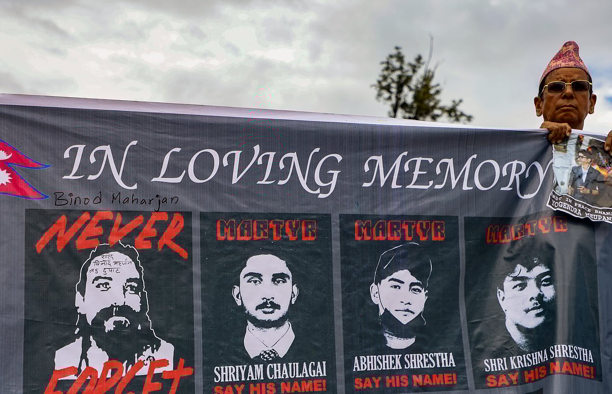 Commemorative banners pay tribute to some of the youth killed in Kathmandu