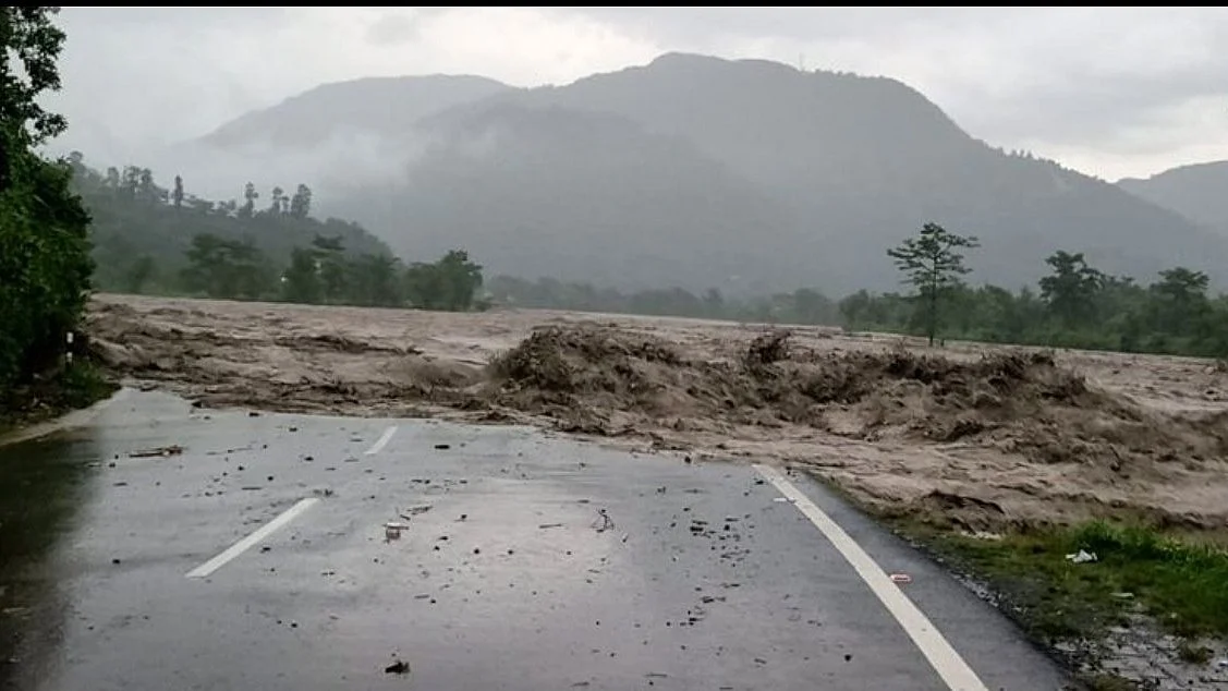 Swollen rivers swept away buildings, bridges and roads