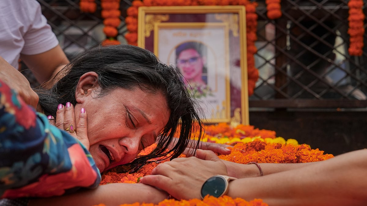 A family member mourns for their kin killed in the recent Gen-Z uprising in Nepal