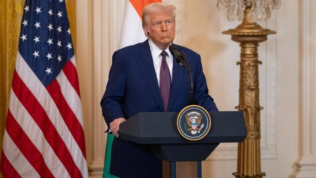 Donald Trump attends a press conference at White House