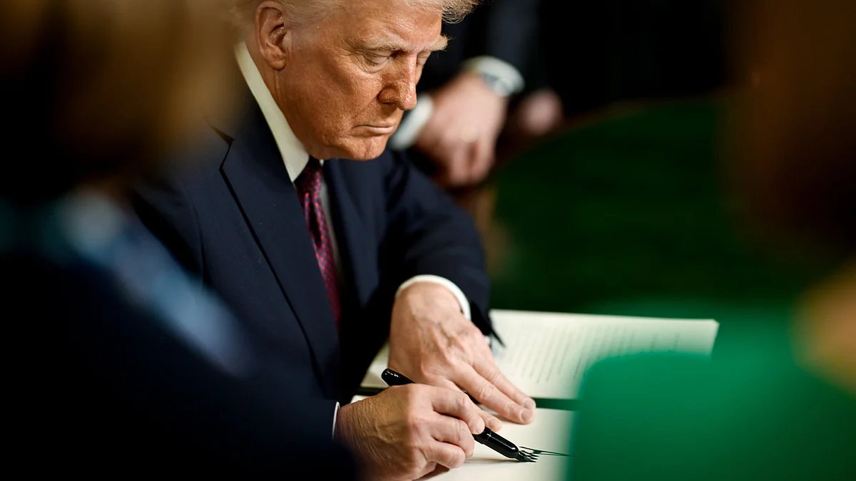 Donald Trump signs an executive order