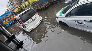 Puja buzz meets rain fury: Kolkata submerged after record showers