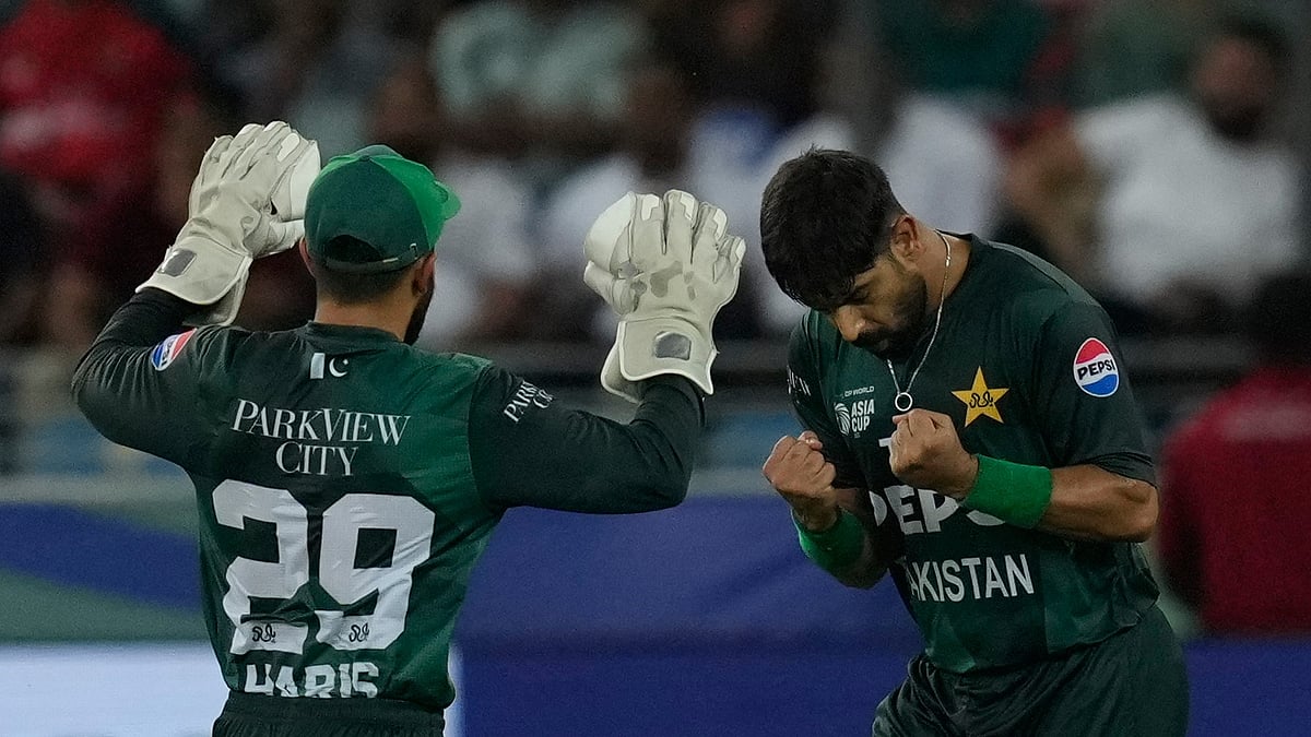 Haris Rauf celebrates with a teammate after striking crucial blow against Bangladesh in Asia Cup.