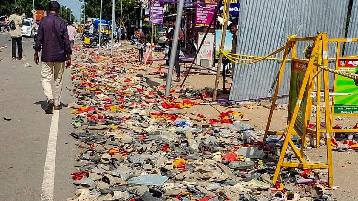 Abandoned footwear scattered on the road mark the tragic aftermath of the stampede in Karur.