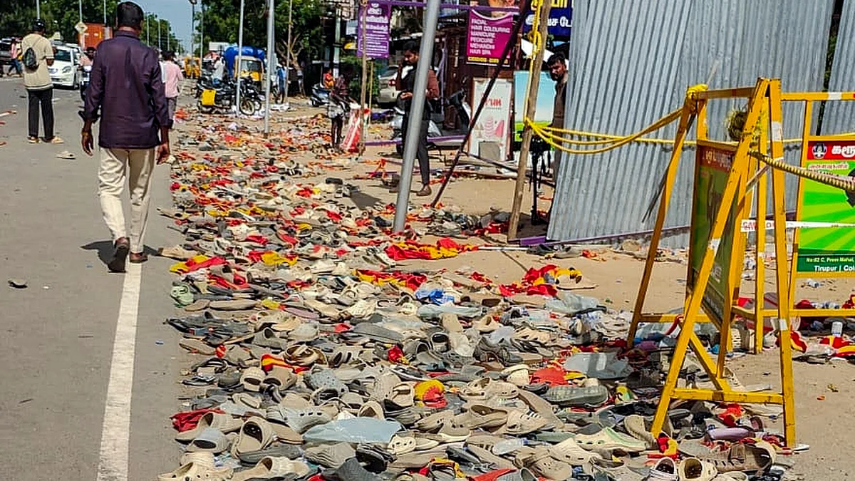 Abandoned footwear scattered on the road mark the tragic aftermath of the stampede in Karur.