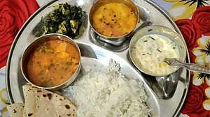 Rice, roti, dal, aloo, saag, boondi ka raita... That's not a balanced meal, India!