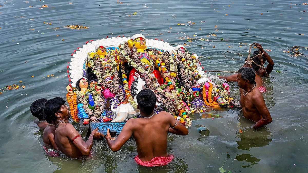 Devotees bid farewell to Goddess Durga with idol immersion in Nadia on Vijaya Dashami.