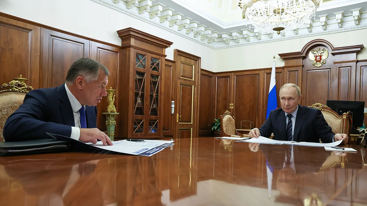 Vladimir Putin listens to deputy PM Marat Khusnullin during a meeting in Moscow.