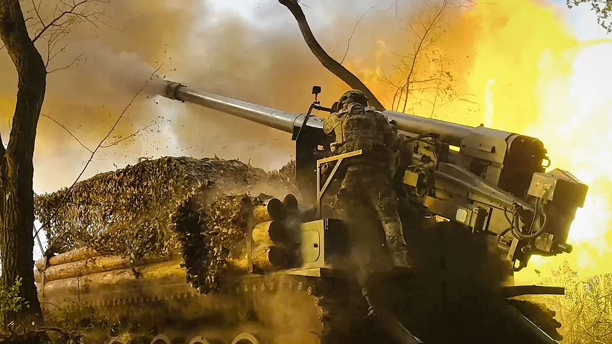 A Russian Giatsint-S self-propelled gun fires towards undisclosed Ukrainian positions