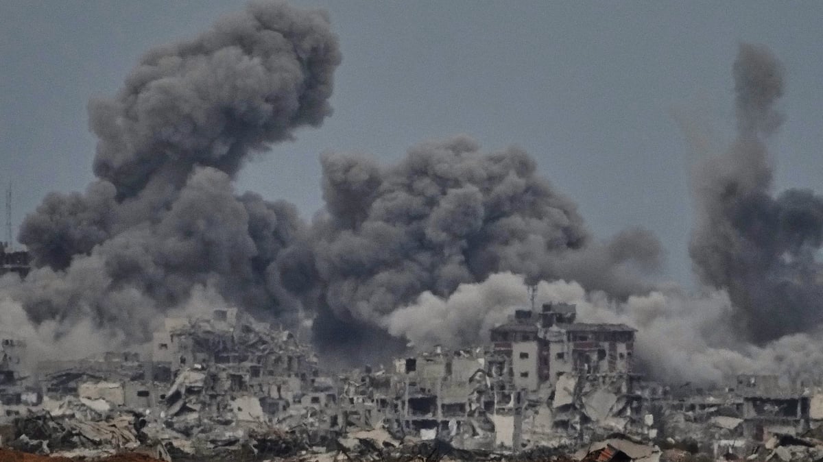 Smoke rises from an Israeli strike in Gaza, hours before the formal ceasefire announcement