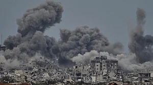 Smoke billows into the sky after an Israeli strike hits Gaza.