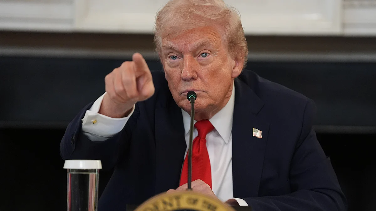 Donald Trump speaks during a meeting at White House on 8 October.