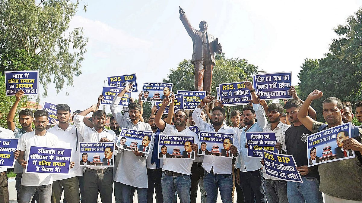 Protest against anti-Dalit atrocities around Ambedkar statue on behalf of CJI B.R. Gavai