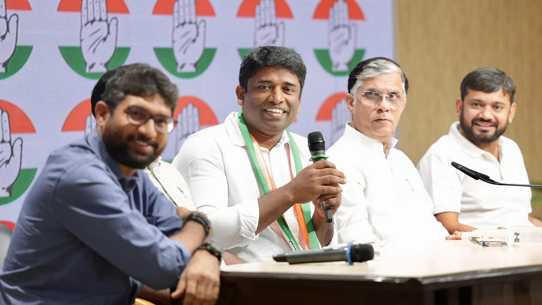 Ex-IAS officer Kannan Gopinathan holds a press conference alongside Pawan Khera