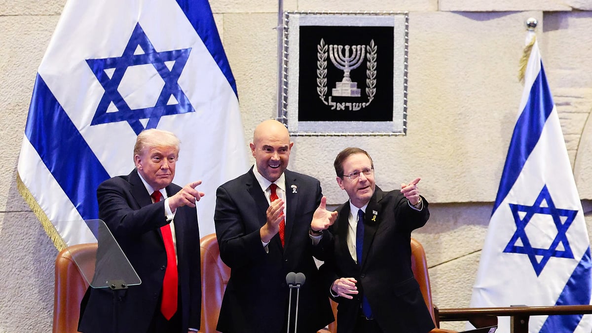 President Trump reacts as he receives a standing ovation before speaking at Knesset.