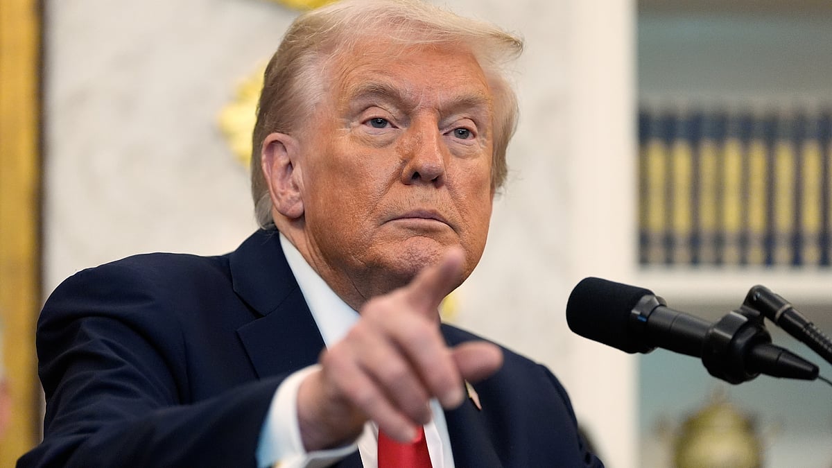 Donald Trump speaks at White House on 16 October.