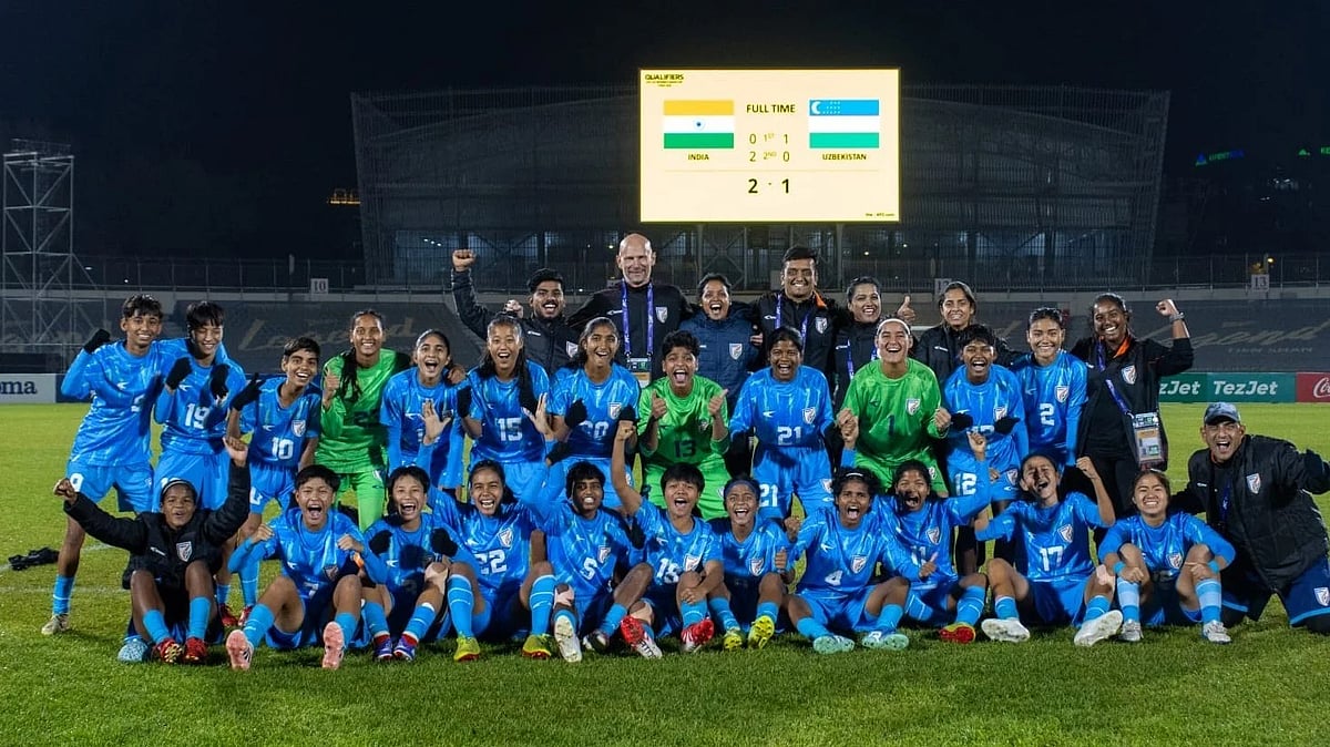 Joakim Alexandersson (at the back) with jubilant Under-17 girls on Friday night