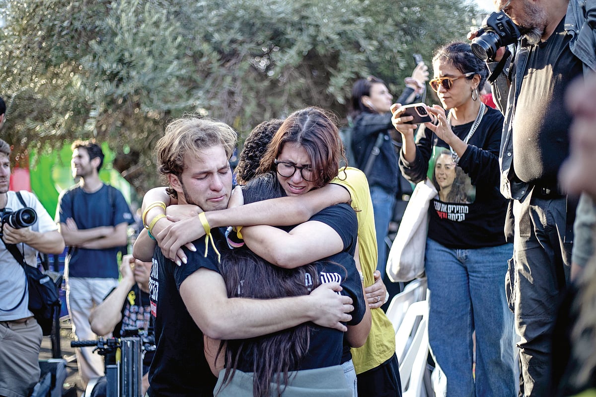 Israeli hostages released by Hamas reunite with their kin in Tel Aviv