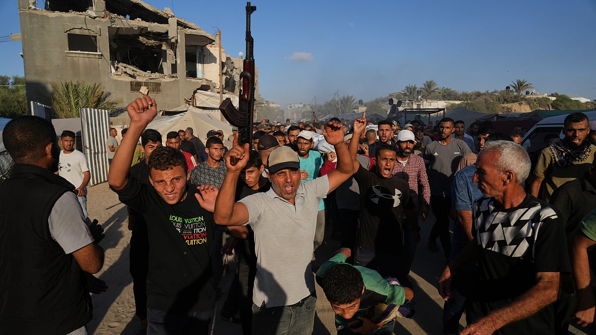 Mourners carry the bodies of Palestinians killed in Israeli strikes in Gaza Strip.