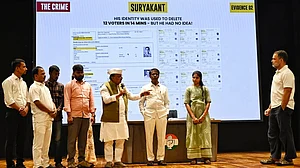 Rahul Gandhi (right) with voters from Aland at his 18 Sep press conference