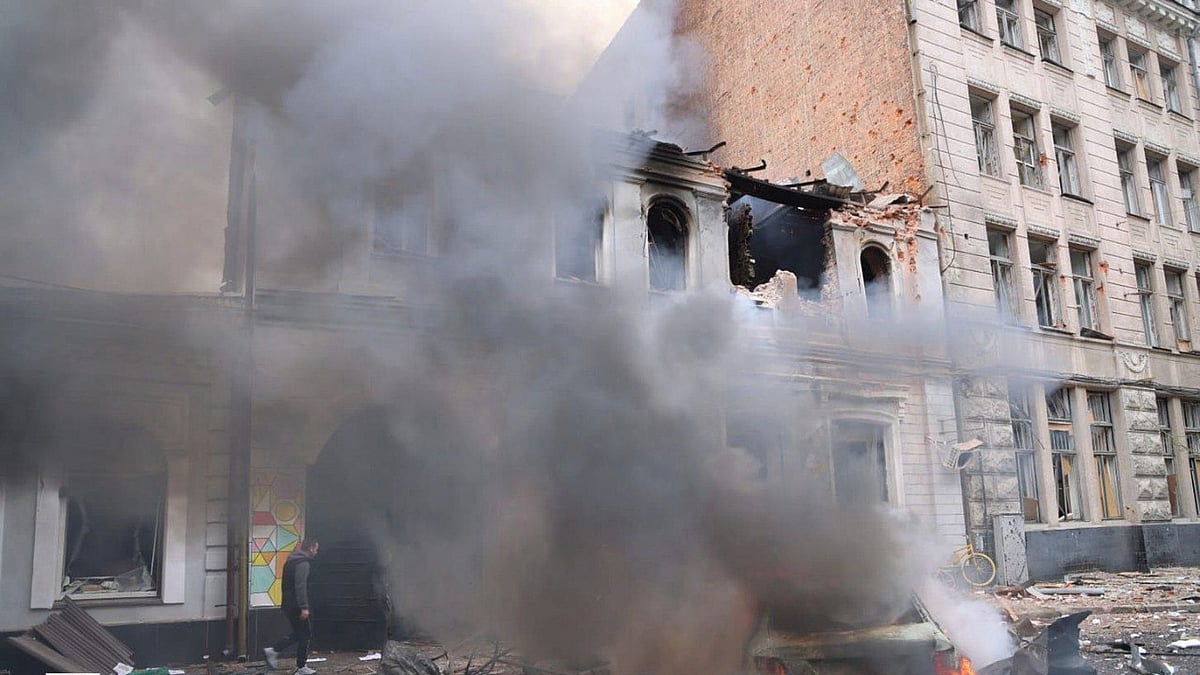 Smoke billows from a kindergarten in Kharkiv after a Russian drone strike on 22 October.
