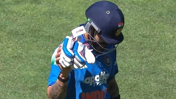 IND vs AUS: Gloves off, right hand up — did Virat Kohli hint at retirement?
