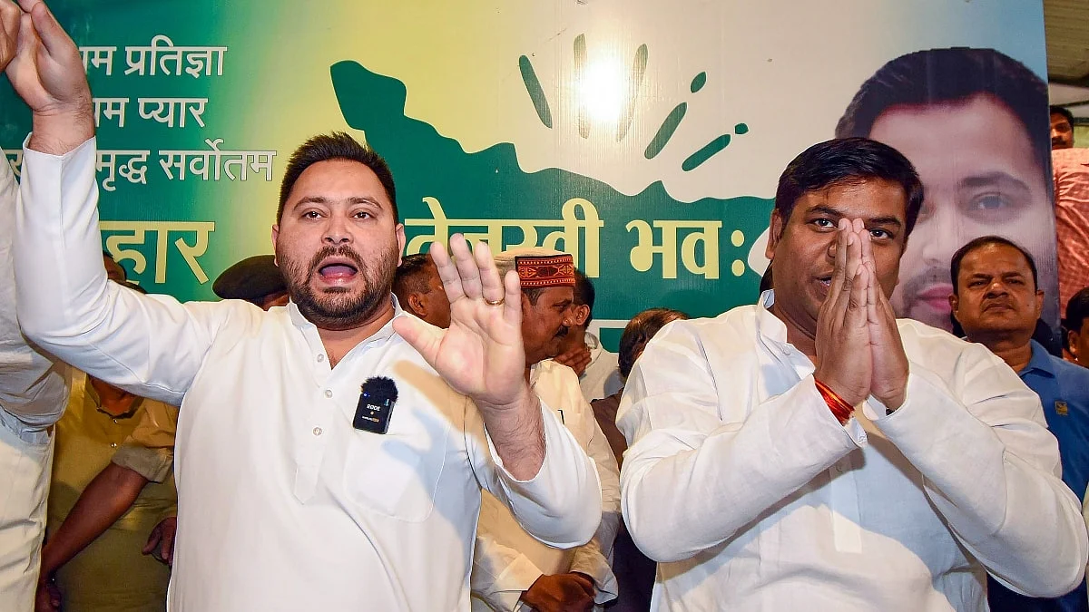 RJD leader Tejashwi Yadav and Mukesh Saini