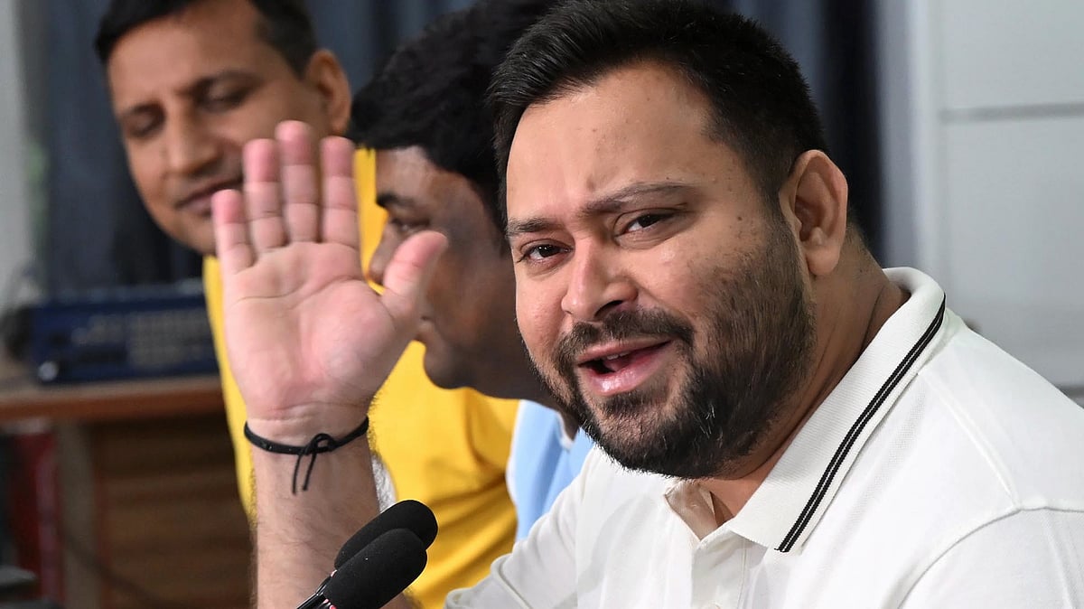 Tejashwi Yadav addresses a press conference in Patna on 26 October.
