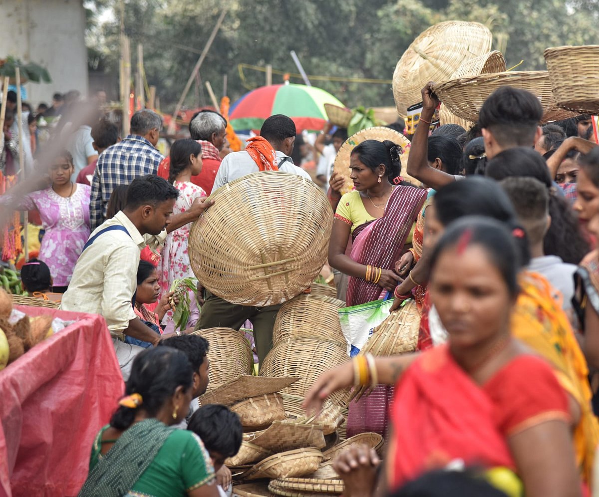 Devotees immersed in holy waters at sunrise, offering prayers to the Sun.