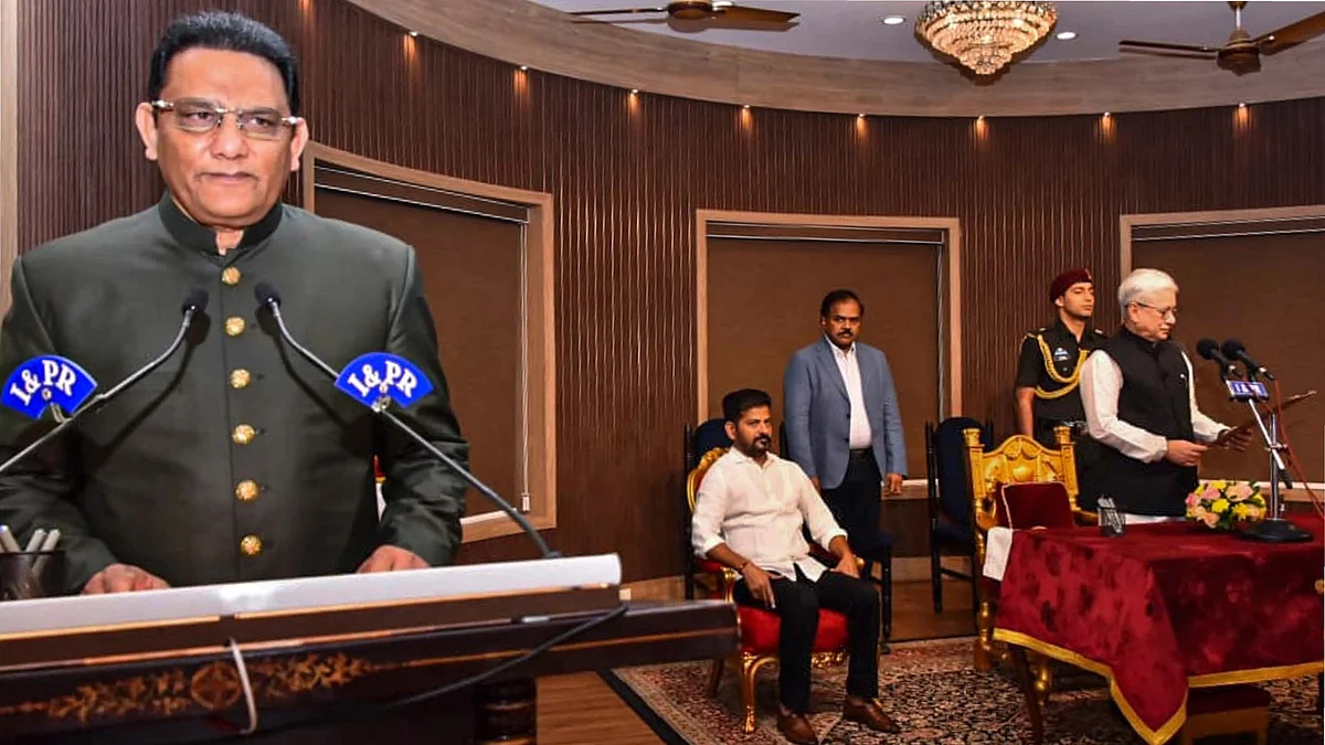 Mohammad Azharuddin taking oath as Telangana minister. (Photo: PTI)