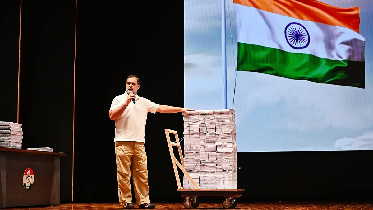 Rahul Gandhi shows hard copies of the Haryana electoral rolls 