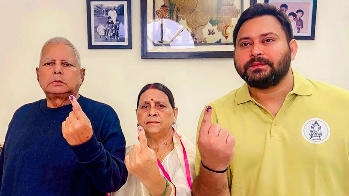 RJD chief Lalu Prasad with wife Rabri Devi and son Tejashwi Yadav