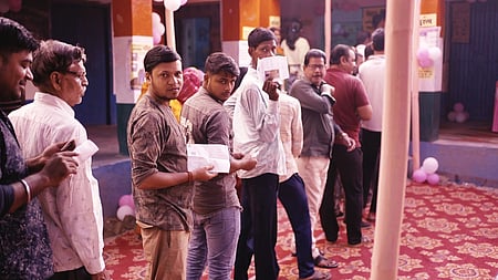 Voters at a polling booth