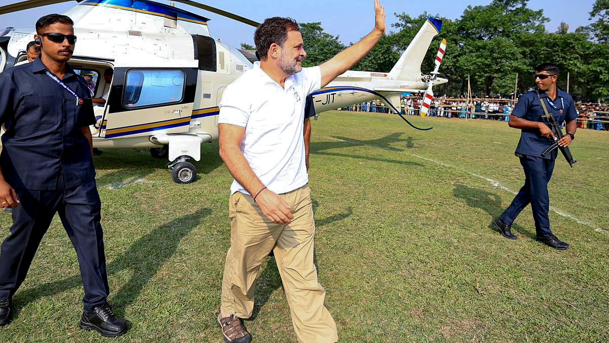 Rahul Gandhi greets supporters as he arrives to address a public meeting in Bihar