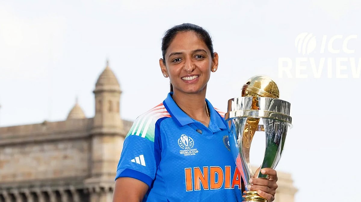 Harmanpreet Kaur poses with the World Cup trophy